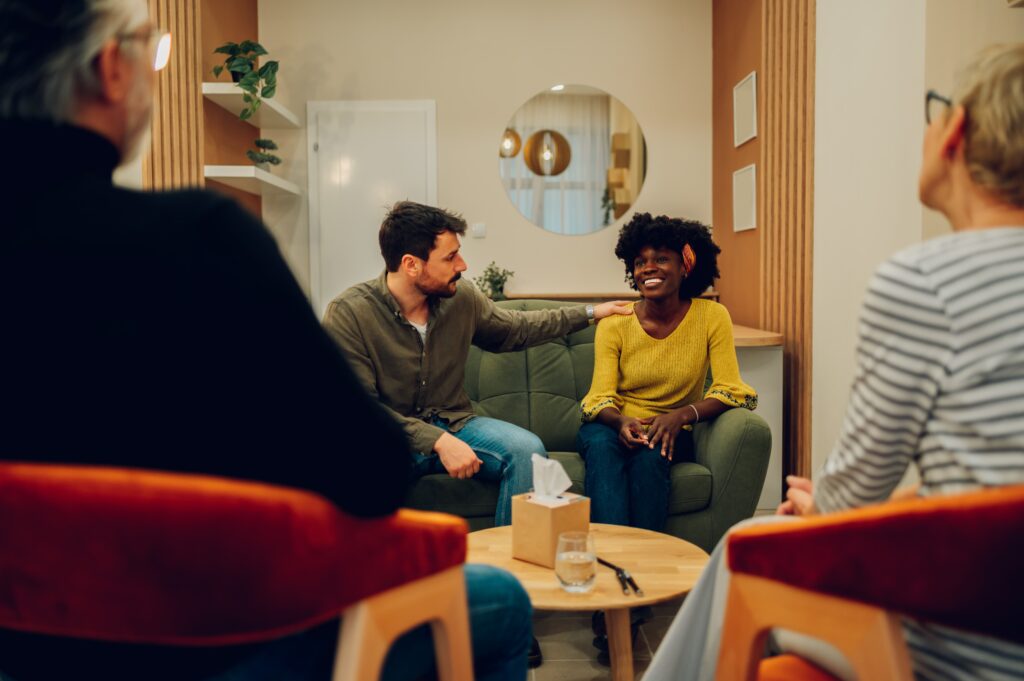 Therapist guiding couple group therapy for addiction at Serenity Path Recovery